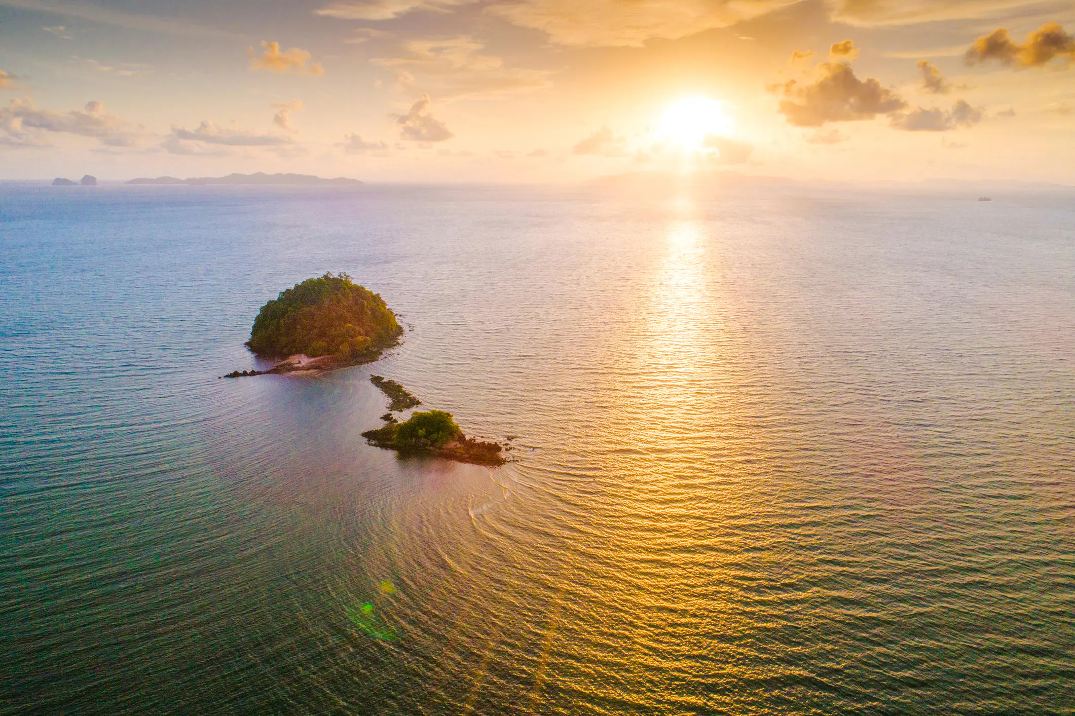 Sunset view over islands during 7 Islands Sunset Cruise, Krabi.