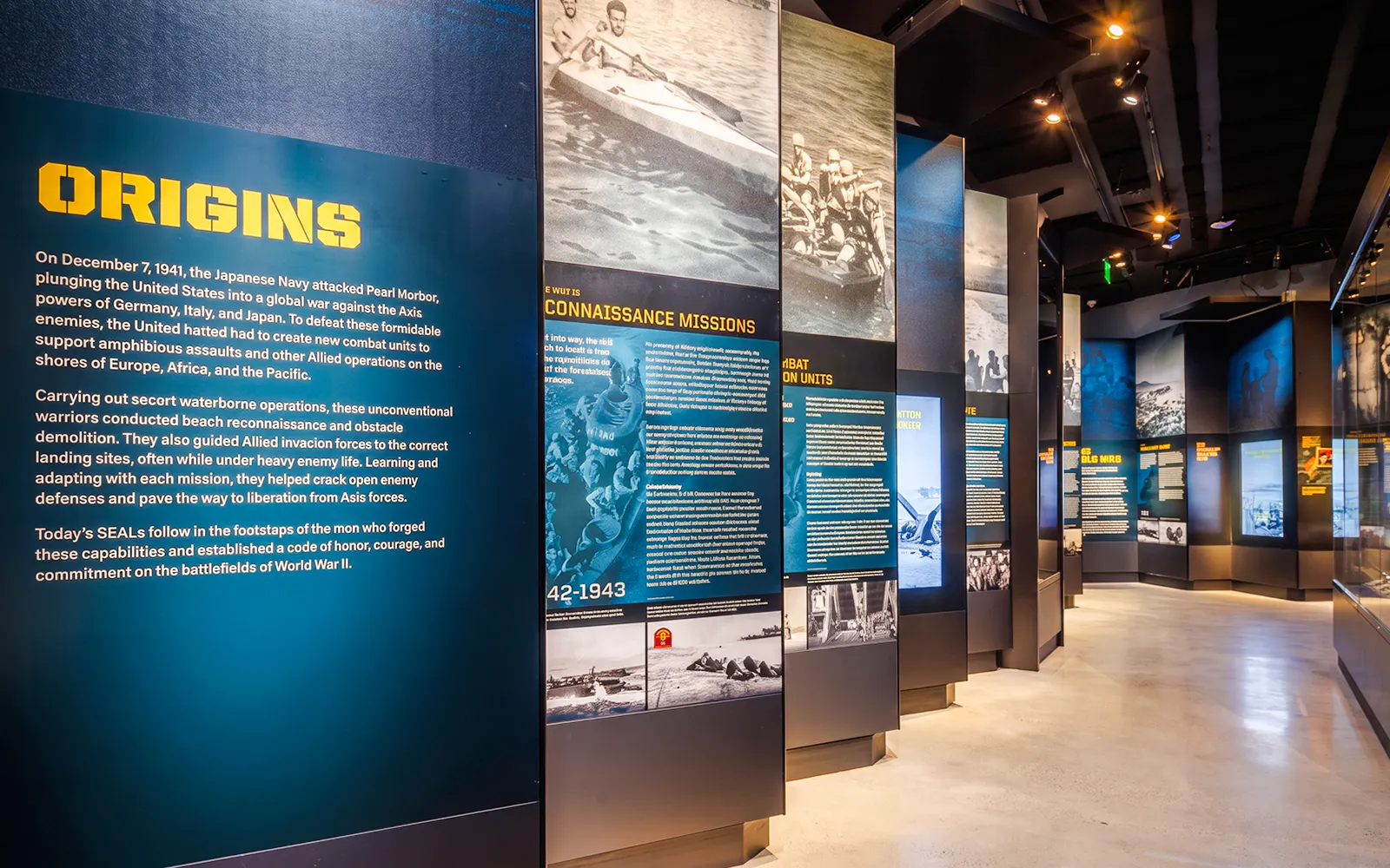 Exhibit panels detailing Navy SEAL history at The National Navy SEAL Museum, San Diego.
