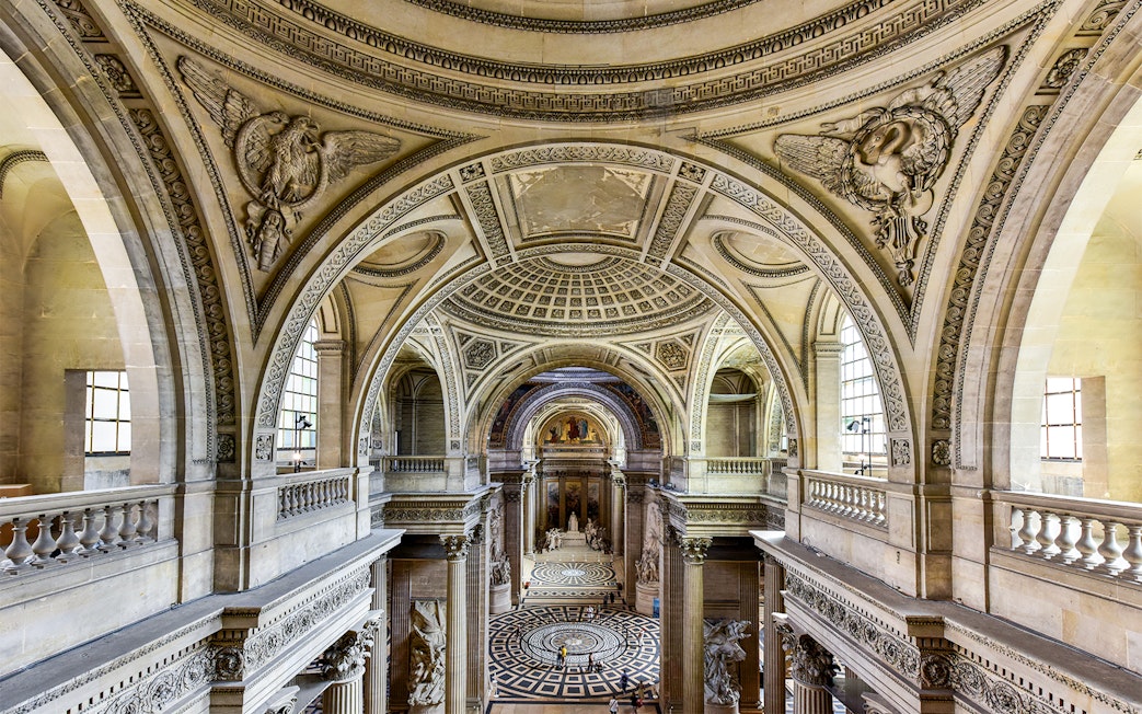 Paris Pantheon main hall with ornate arches and detailed ceiling.
