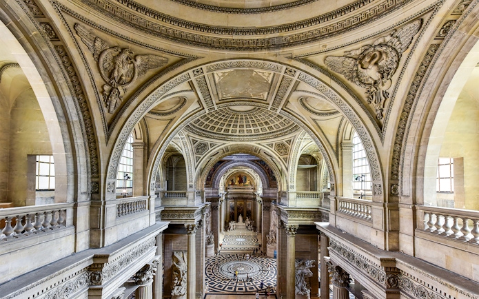 Paris Pantheon main hall with ornate arches and detailed ceiling.
