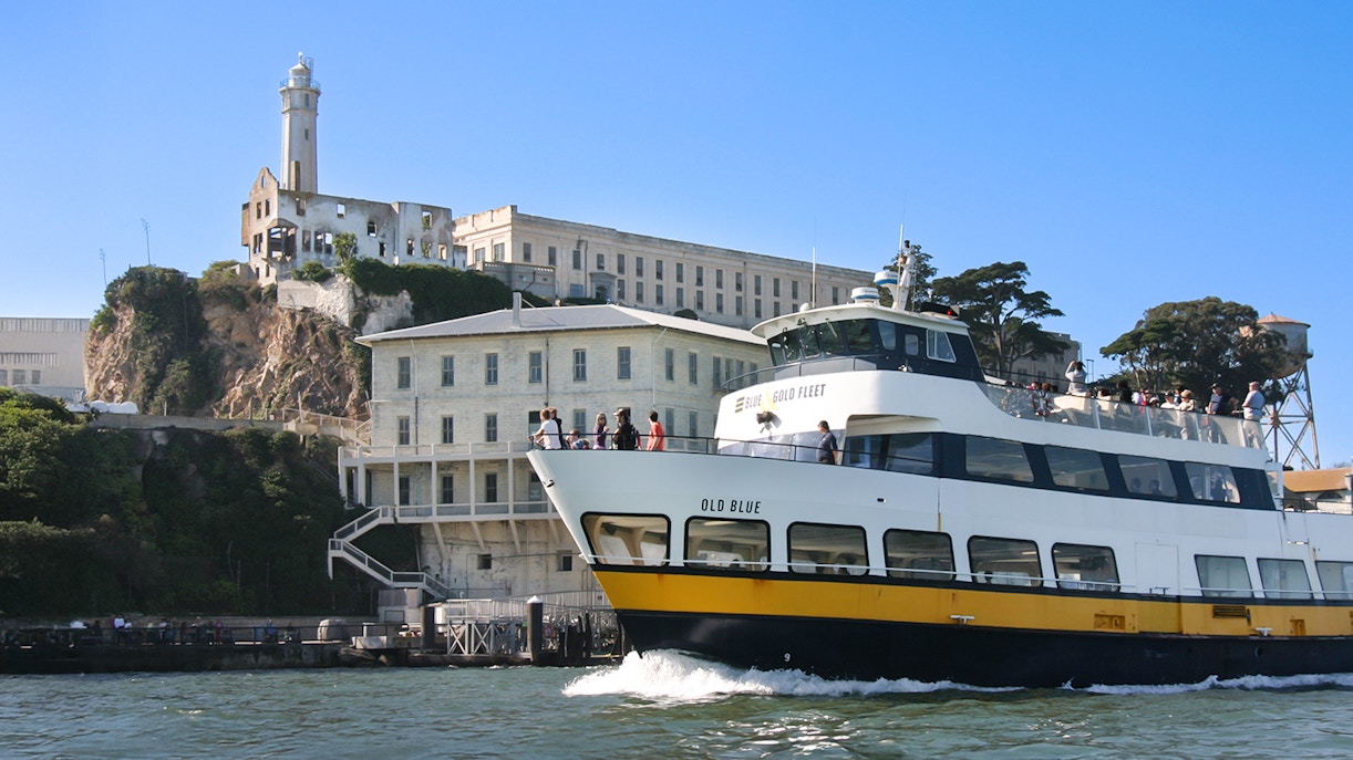 Ferry passing by Alcatraz Island in San Francisco, California.