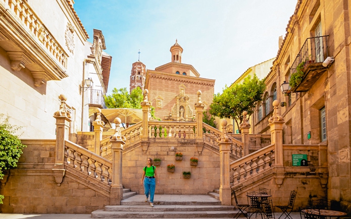 Stone staircase and historic architecture in Poble Espanyol, Barcelona.