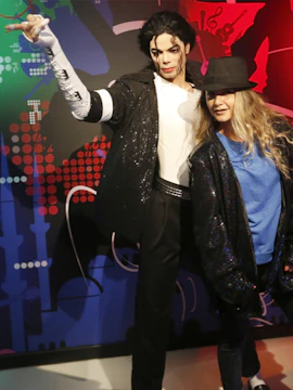 Wax figure at Madame Tussauds Istanbul with a visitor.