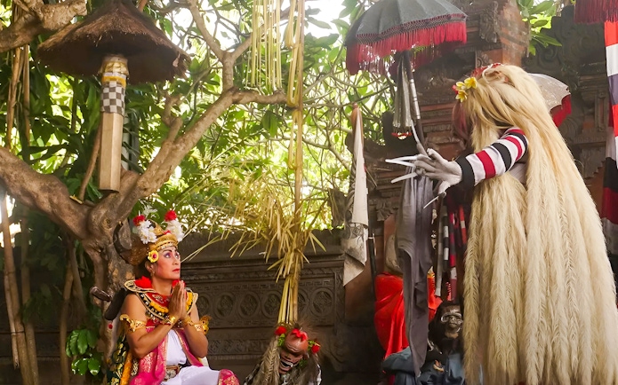 Performers in traditional costumes at Uluwatu Kecak Fire Dance Show, Bali.