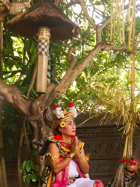 Performers in traditional costumes at Uluwatu Kecak Fire Dance Show, Bali.