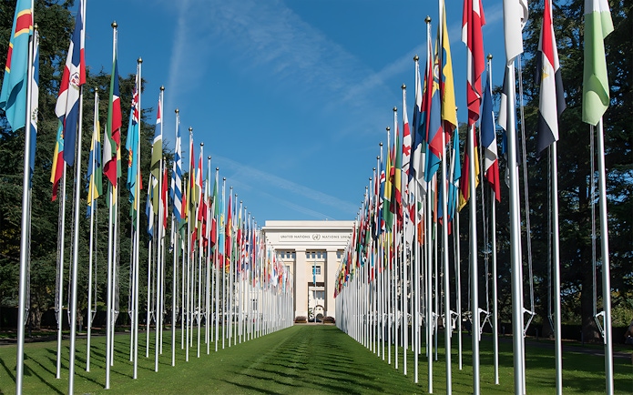 Flags lining the entrance to the United Nations Office at Geneva.