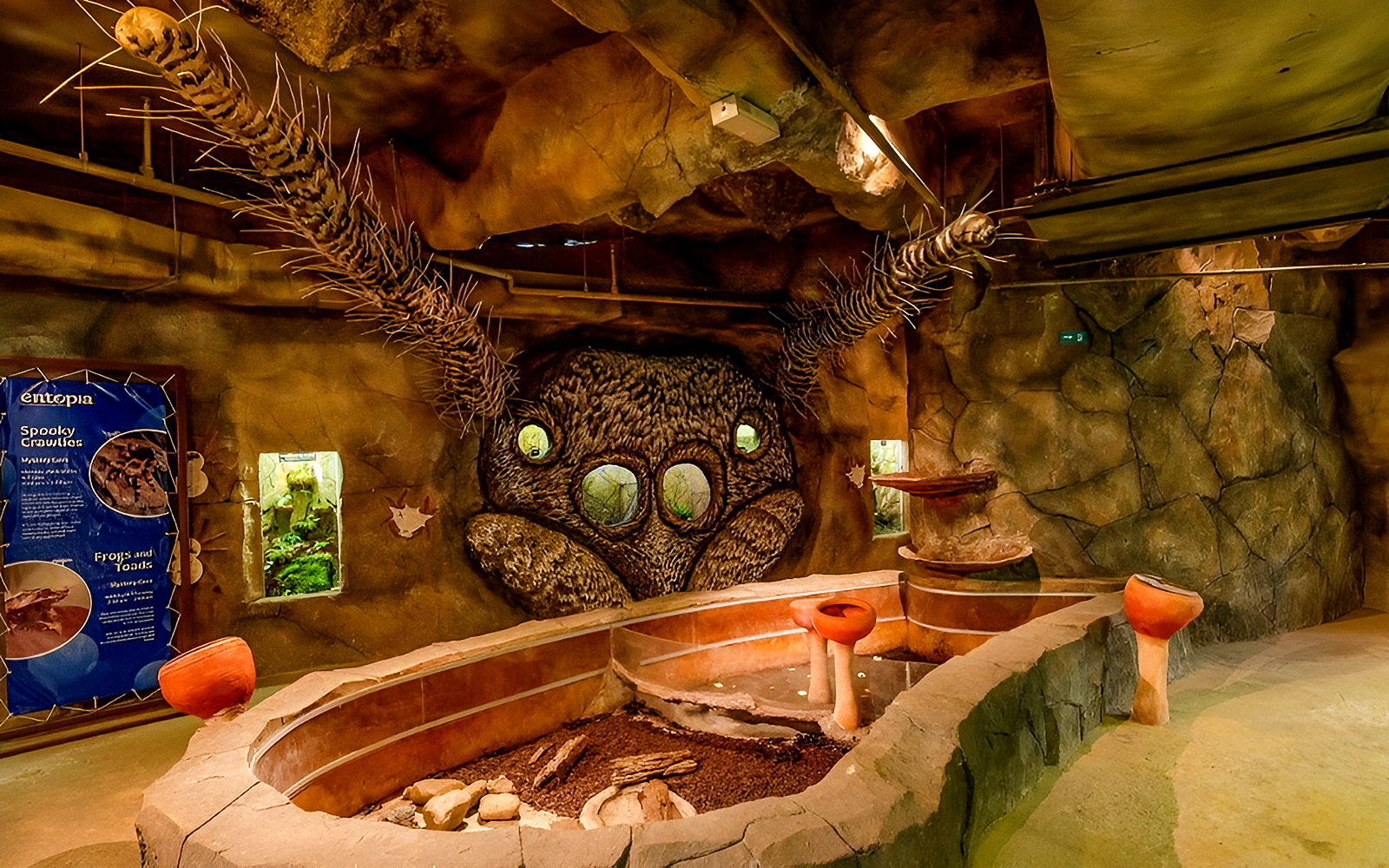 Entopia Penang exhibit featuring a giant insect sculpture and educational displays.