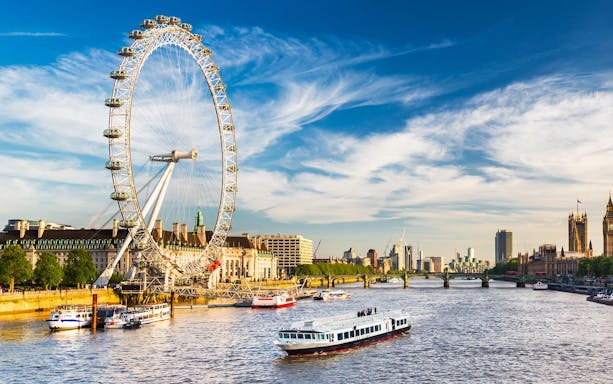 London Eye and Thames River view on sightseeing bus tour.