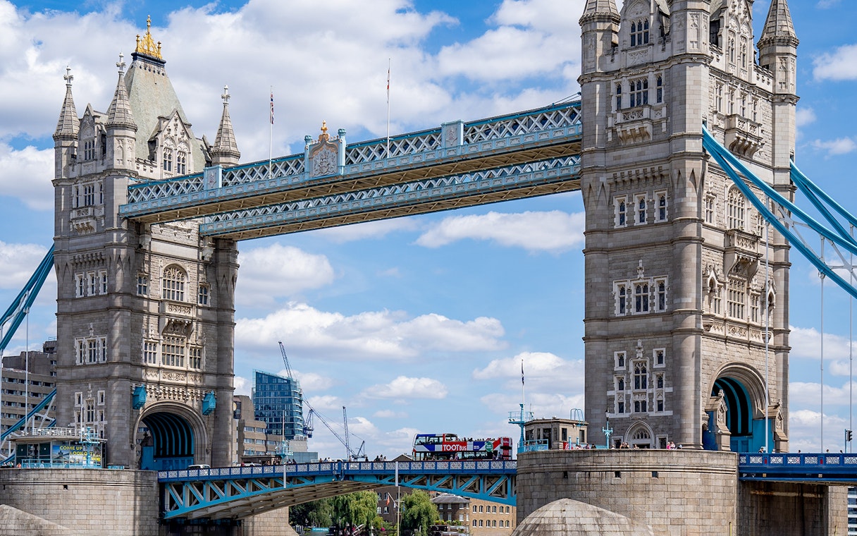 Tootbus crossing Tower Bridge in London on a Hop-On-Hop-Off tour.