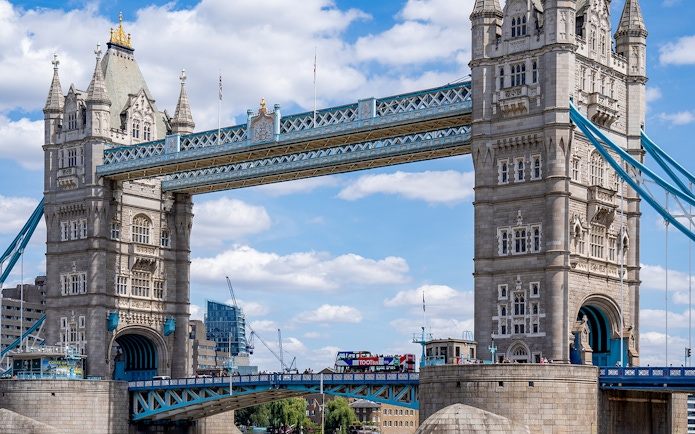Tootbus crossing Tower Bridge in London on a Hop-On-Hop-Off tour.