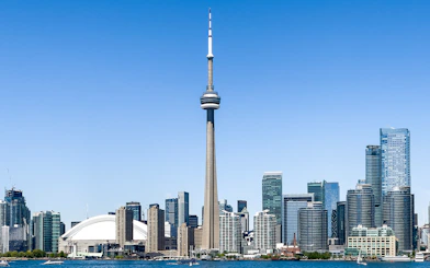 Toronto skyline featuring the CN Tower and surrounding buildings.