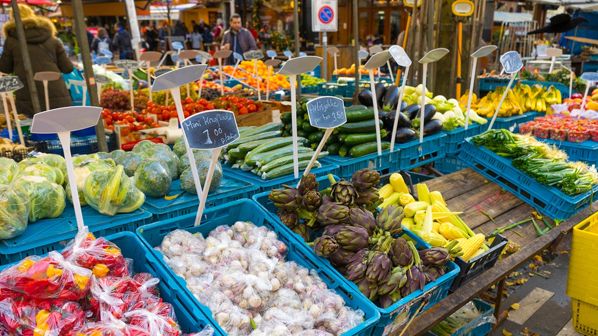 Amsterdam market stall with fresh vegetables and fruits in December.