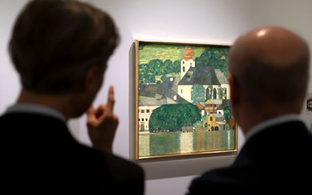 Visitors viewing a painting at the Heidi Horten Collection exhibition.