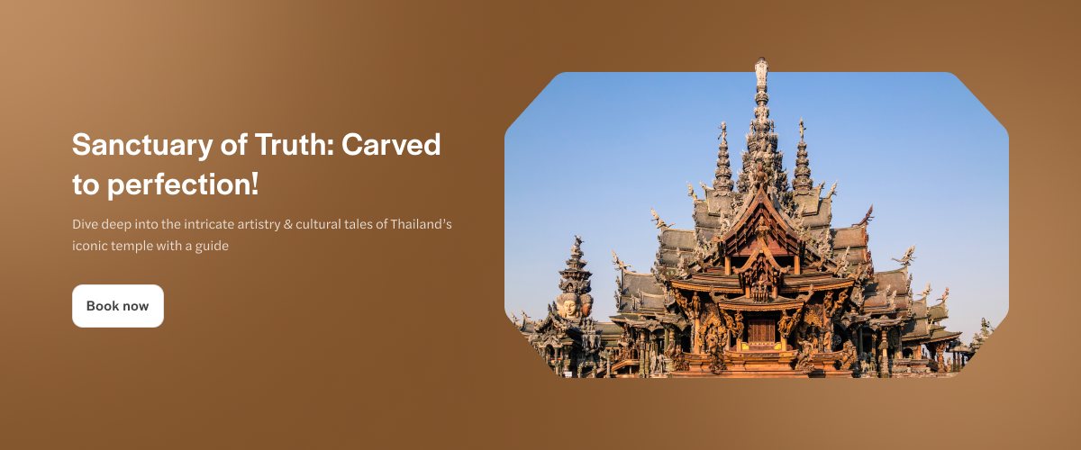 Sanctuary of Truth temple in Pattaya, Thailand, showcasing intricate wooden carvings.