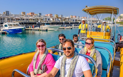 Tourists on a speed boat at Al Marjan Island marina during a 45-minute tour.