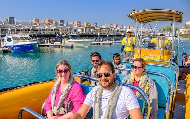 Tourists on a speed boat at Al Marjan Island marina during a 45-minute tour.