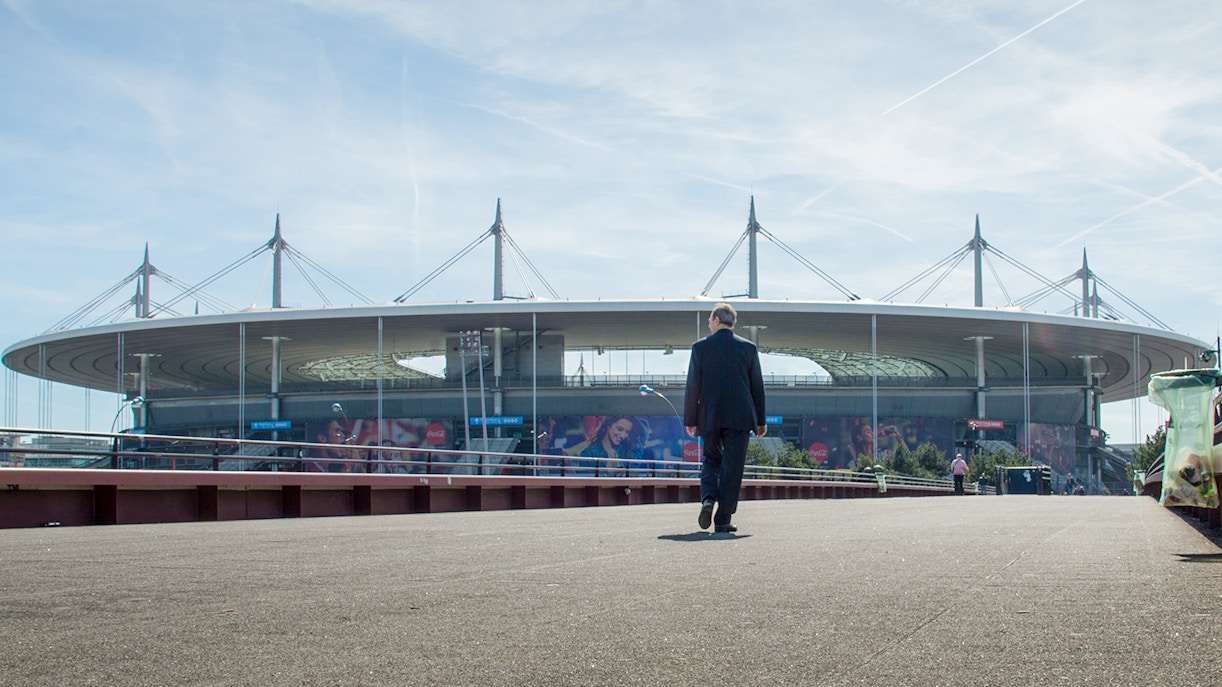Man approaching the entry of Stade de France