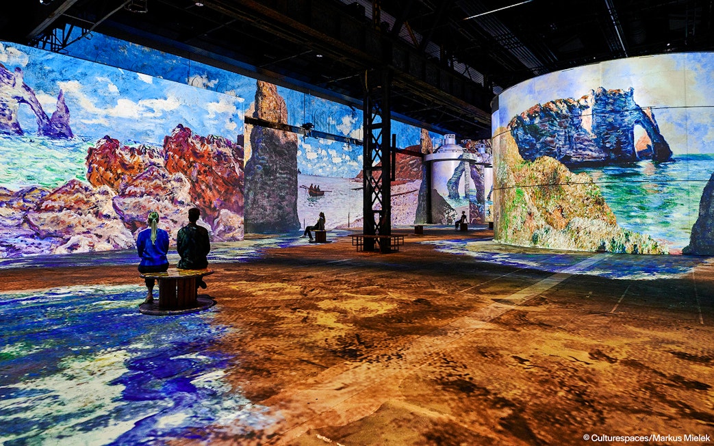 Immersive art projections at Phoenix des Lumières exhibition.