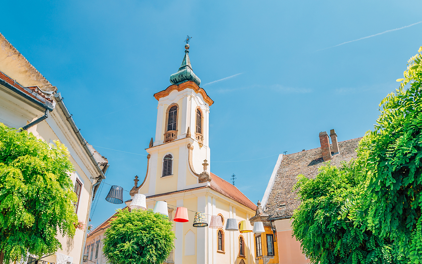 Blagovestenska Church tower in Szentendre's medieval old town main square, Hungary.