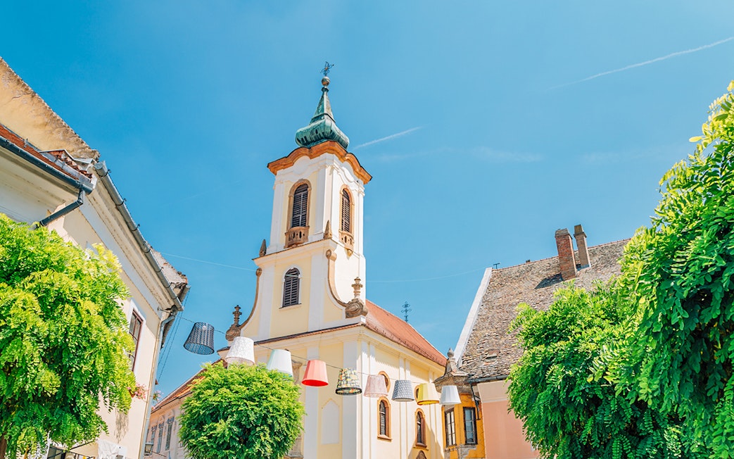 Blagovestenska Church tower in Szentendre's medieval old town main square, Hungary.