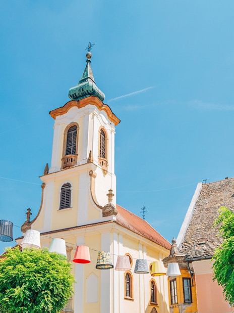 Blagovestenska Church tower in Szentendre's medieval old town main square, Hungary.