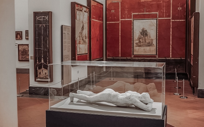 Sculpture of a reclining figure in the National Archaeological Museum of Naples.