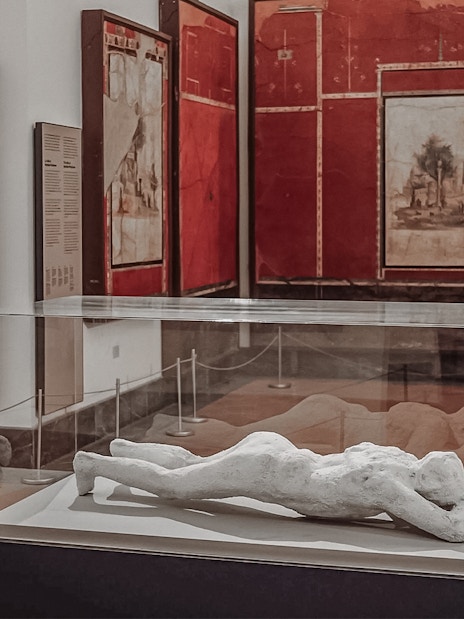 Sculpture of a reclining figure in the National Archaeological Museum of Naples.