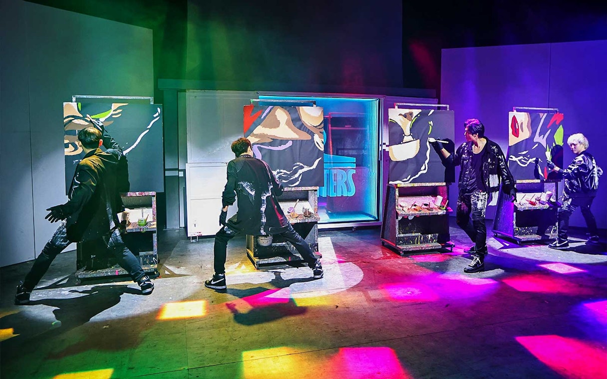 Performers painting on stage during a vibrant Painter Show in Gapyeong, South Korea.