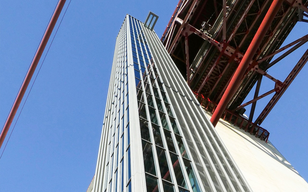 Pilar 7 Bridge Experience viewing platform with red steel structure above.
