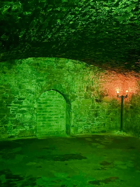 Underground vault with stone walls and archway, Niddry Street, Edinburgh.