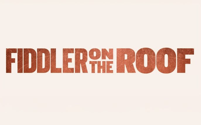 Fiddler on the Roof logo in bold red letters
