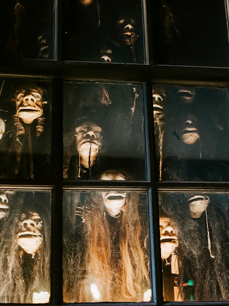 Shrunken heads in a window at The Wizarding World of Harry Potter, Diagon Alley, Orlando.