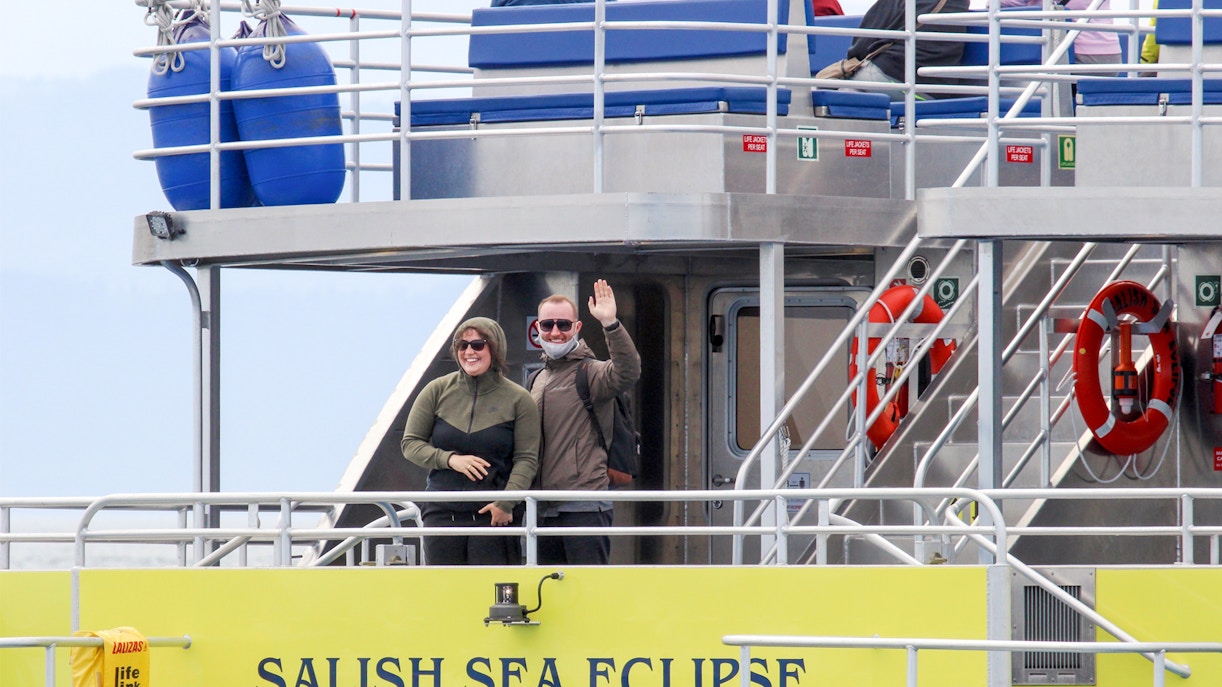 Guests on the Salish Sea Eclipse catamaran whale watching in Victoria, Canada.