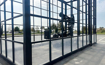 Oil pumpjack encased in glass at Gobustan National Park, Baku.