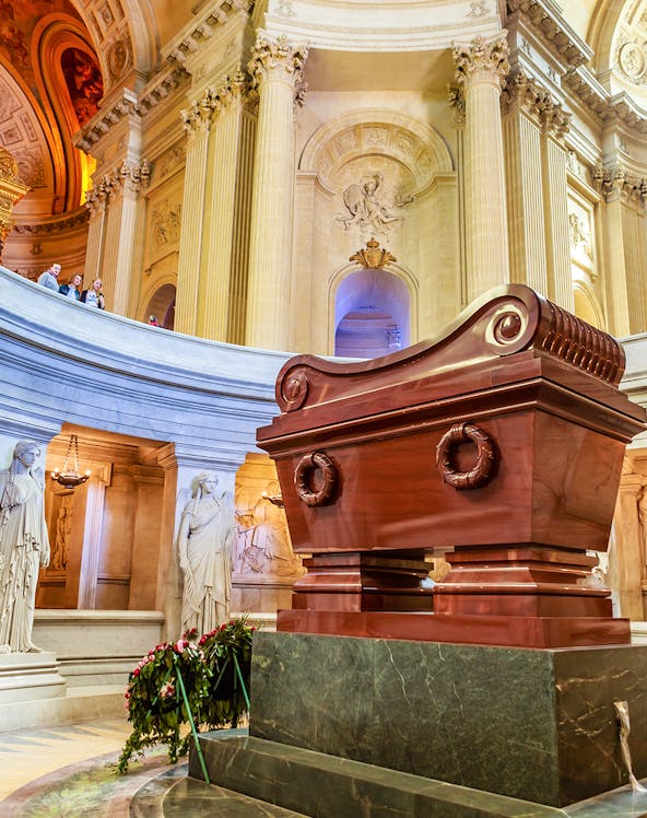 Tomb of Napoleon in Les Invalides, Paris, with ornate architecture and statues.