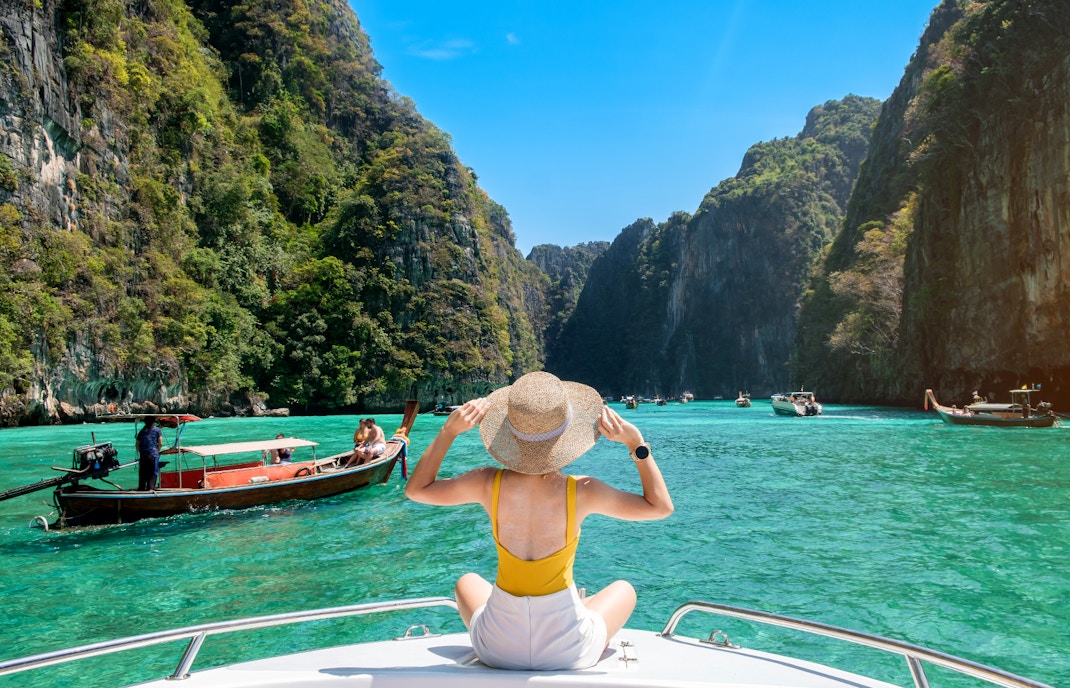 Woman on a boat exploring Phi Phi Island