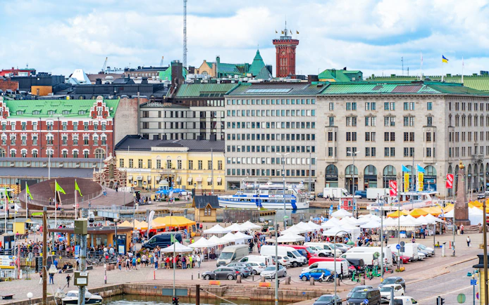 Market Square in Helsinki with bustling harbourside market and colorful stalls.
