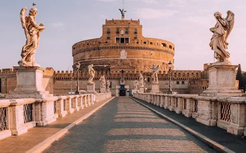 Castel Sant'Angelo and statues on the Ponte Sant'Angelo in Rome during a private golf cart tour.