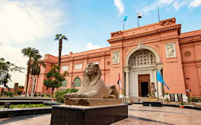Sphinx statue in front of the Egyptian Museum entrance in Cairo, Egypt.