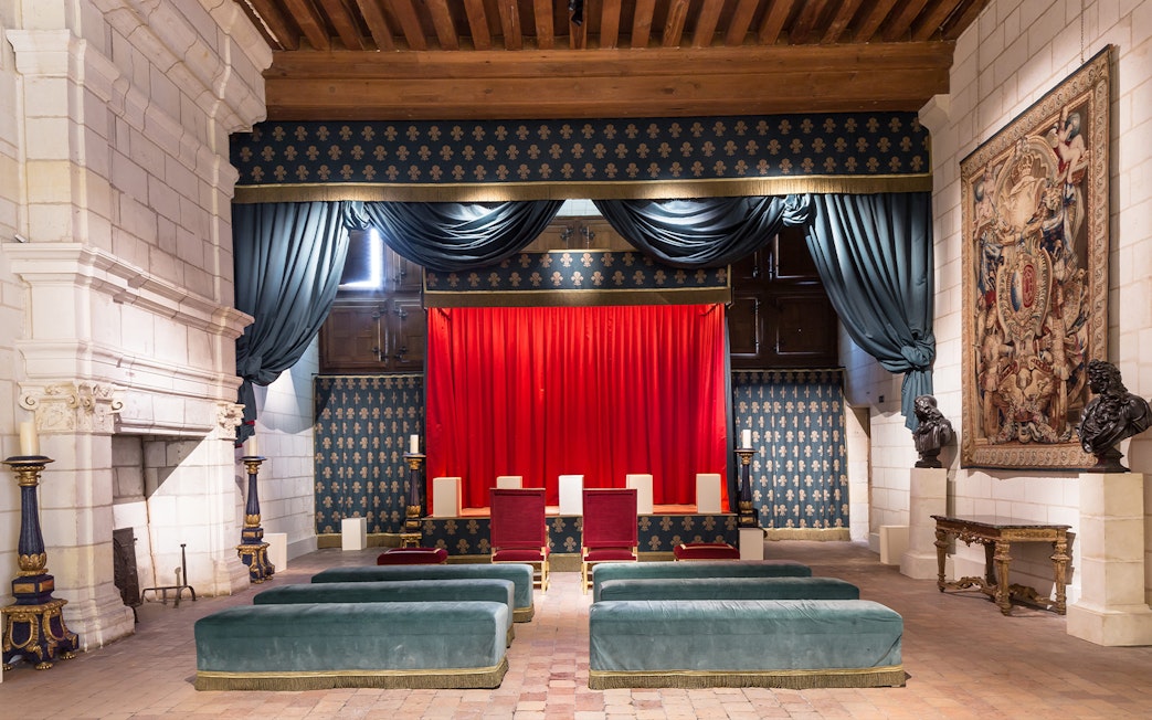 Theatre de Moliere stage with red curtains in Chateau de Chambord, France.