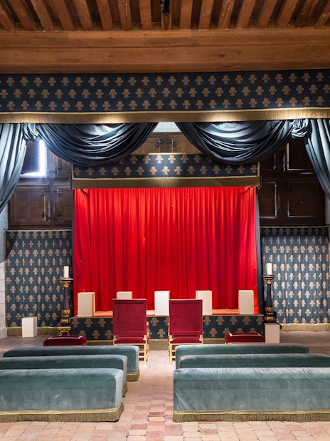 Theatre de Moliere stage with red curtains in Chateau de Chambord, France.