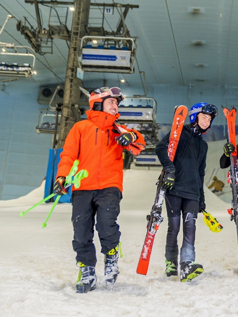 Group skiing at Ski Dubai indoor slope.