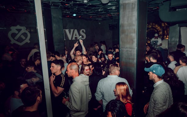 Crowd enjoying nightlife at a club in Krakow during the Krawl through Krakow tour.