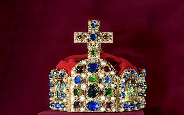 Crown adorned with jewels and pearls at Kunsthistorisches Museum Vienna.