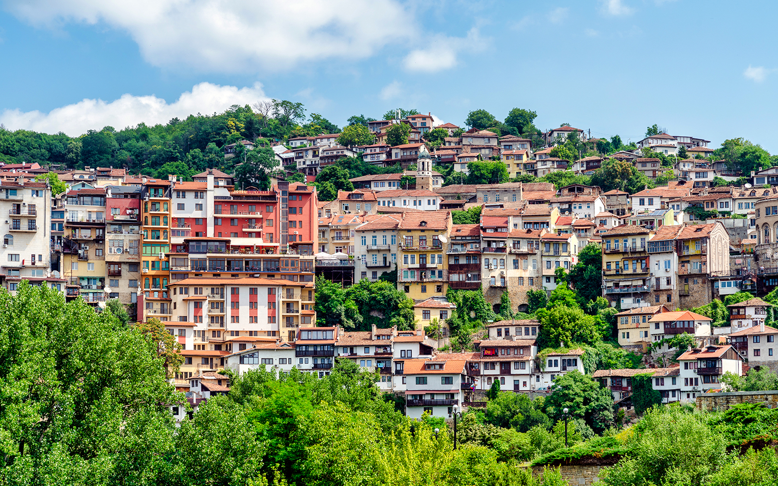 Hillside view of traditional houses in Veliko Tarnovo, Bulgaria.
