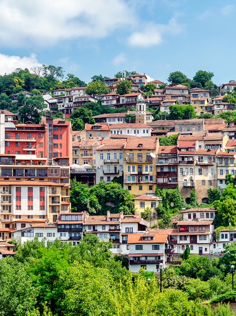 Hillside view of traditional houses in Veliko Tarnovo, Bulgaria.