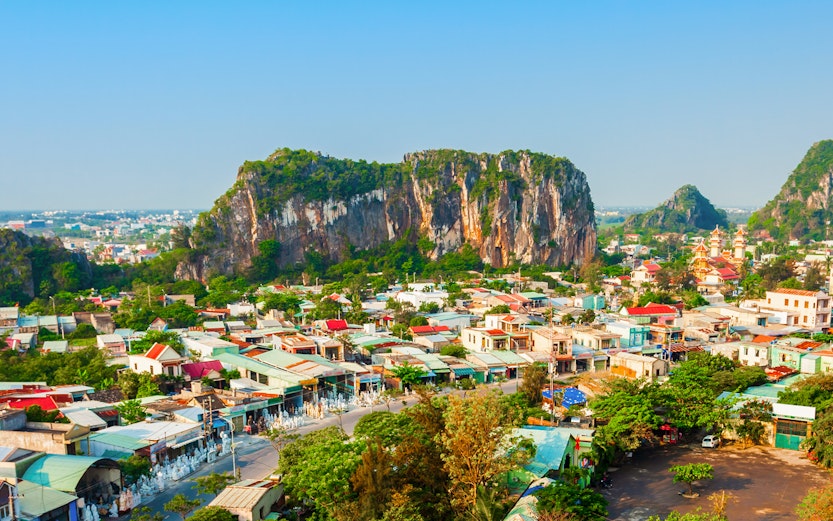 Aerial view of Marble Mountains and surrounding town in Da Nang, Vietnam.