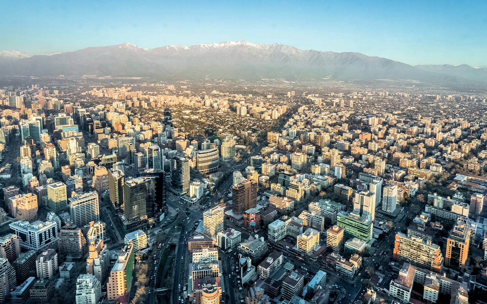 Santiago cityscape with Andes mountains viewed from Sky Costanera, Chile.