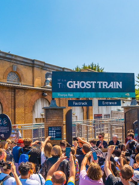 Crowd gathered at Thorpe Park's Ghost Train entrance.