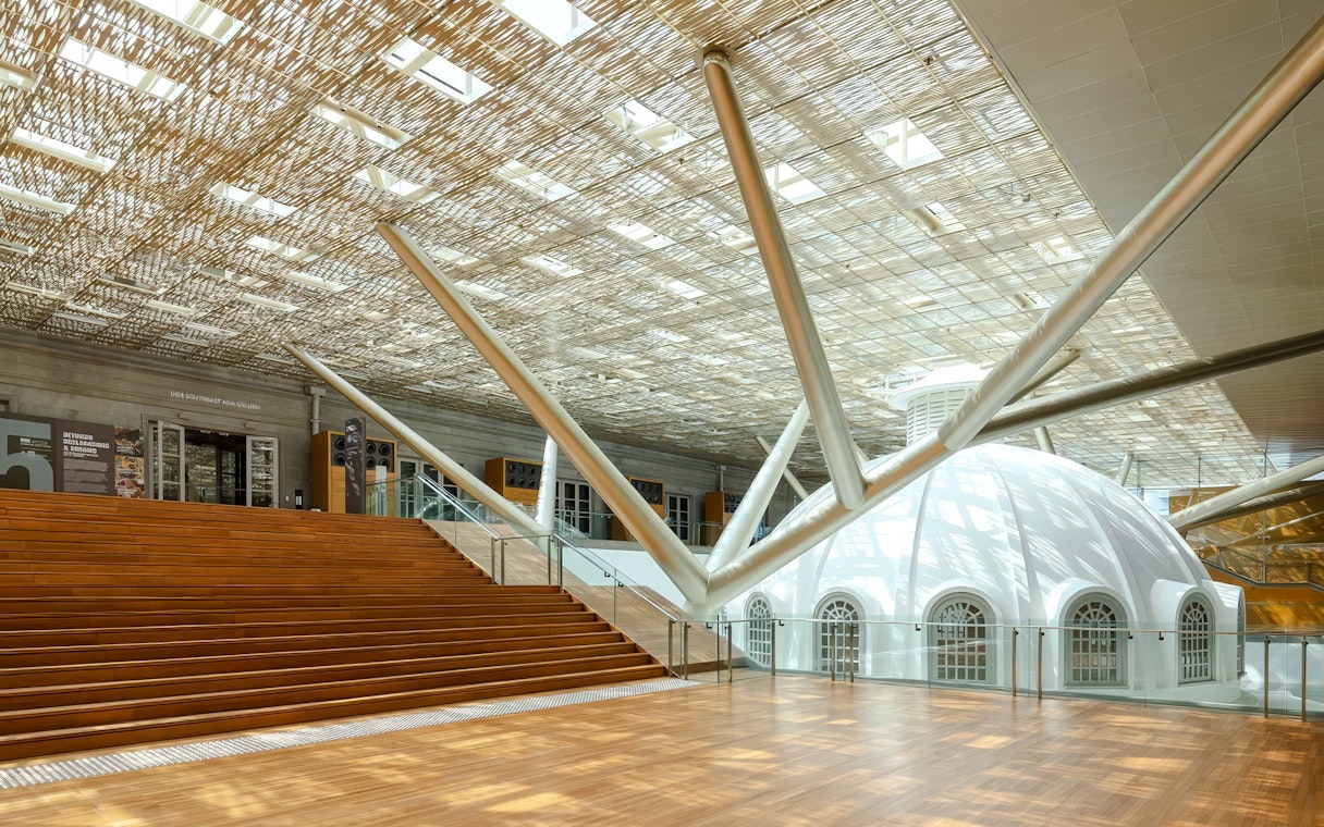 National Gallery Singapore architecture with modern ceiling and dome structure.